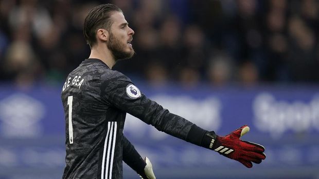 Manchester United's goalkeeper David de Gea gestures during the English Premier League soccer match between Everton and Manchester United at Goodison Park in Liverpool, England, Sunday, March 1, 2020. (AP Photo/Jon Super)