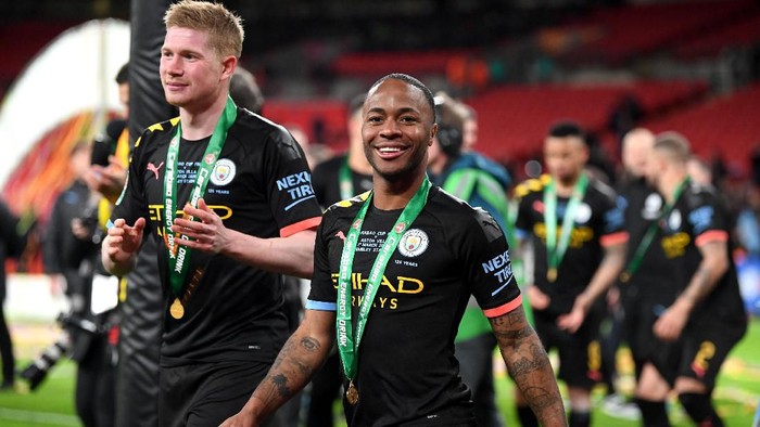 LONDON, ENGLAND - MARCH 01: Raheem Sterling of Manchester City celebrates after his sides victory in the Carabao Cup Final between Aston Villa and Manchester City at Wembley Stadium on March 01, 2020 in London, England. (Photo by Michael Regan/Getty Images)