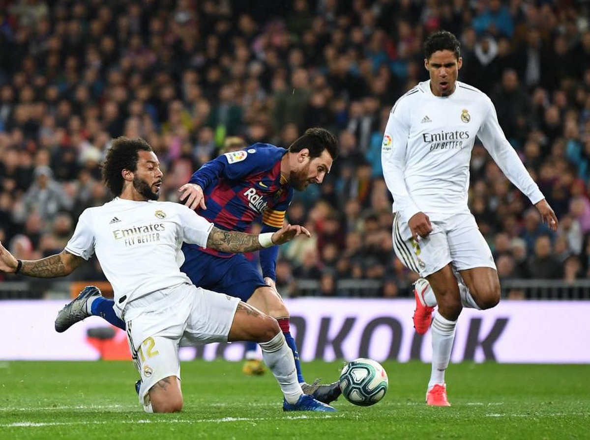 Marcelo begitu girang usai melakukan tekel krusial untuk menggagalkan peluang Lionel Messi (Foto: Getty Images/David Ramos)