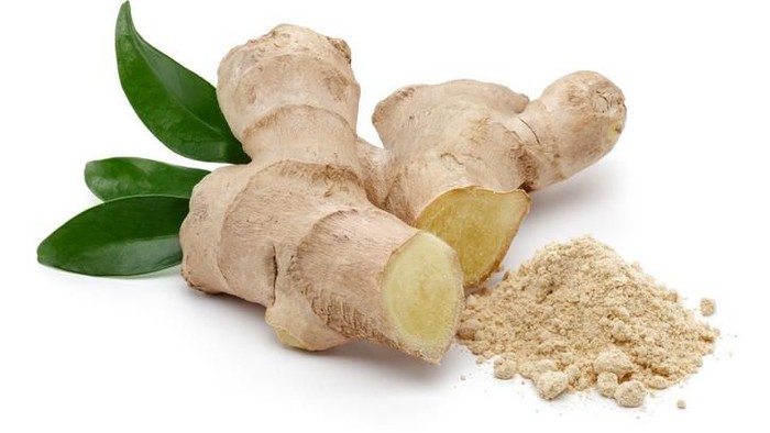 fresh Ginger root and slice isolated on white background with copy space for your text. Top view. Flat lay.
