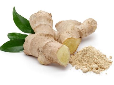 fresh Ginger root and slice isolated on white background with copy space for your text. Top view. Flat lay.