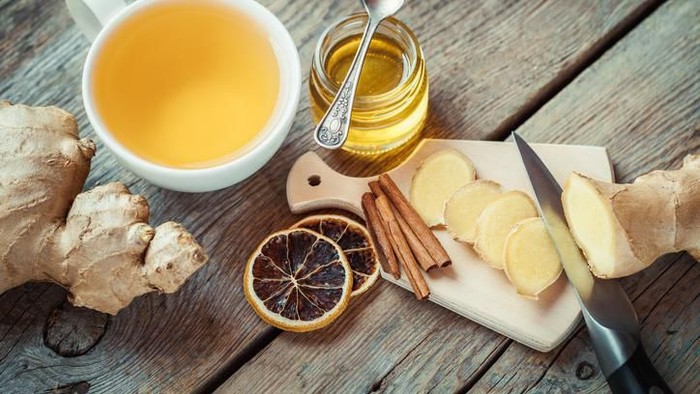 fresh Ginger root and slice isolated on white background with copy space for your text. Top view. Flat lay.