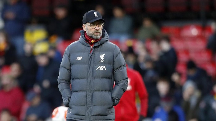 Liverpools manager Jurgen Klopp looks on during warm up before the English Premier League soccer match between Watford and Liverpool at Vicarage Road stadium, in Watford, England, Saturday, Feb. 29, 2020. (AP Photo/Alastair Grant)