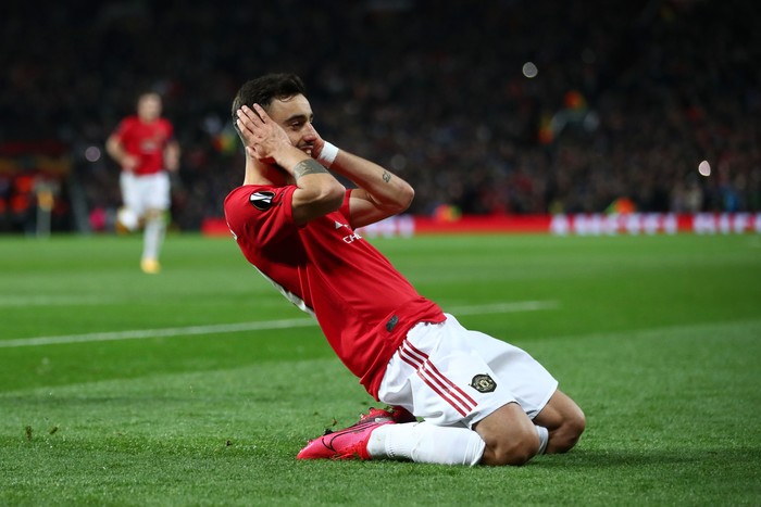 MANCHESTER, ENGLAND - FEBRUARY 27: Bruno Fernandes of Manchester United celebrates after scoring his teams first goal from the penalty spot during the UEFA Europa League round of 32 second leg match between Manchester United and Club Brugge at Old Trafford on February 27, 2020 in Manchester, United Kingdom. (Photo by Clive Brunskill/Getty Images)