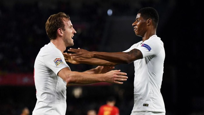 SEVILLE, SPAIN - OCTOBER 15:  Marcus Rashford of England (R) celebrates as he scores his teams second goal with Harry Kane of England during the UEFA Nations League A Group Four match between Spain and England at Estadio Benito Villamarin on October 15, 2018 in Seville, Spain.  (Photo by Michael Regan/Getty Images)