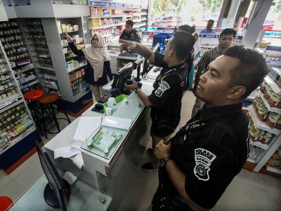 Polda Aceh Gelar Razia Masker di Apotek