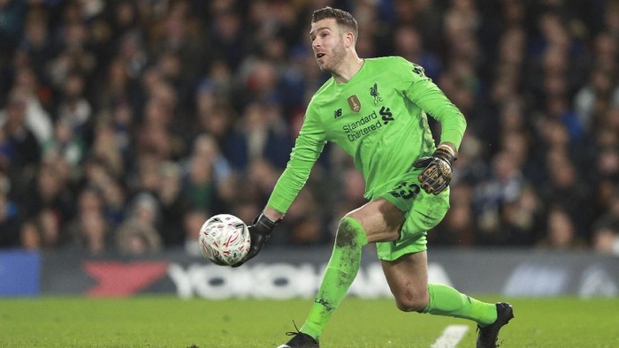 Liverpools goalkeeper Adrian plays the ball during the English FA Cup fifth round soccer match between Chelsea and Liverpool at Stamford Bridge stadium in London Tuesday, March 3, 2020. (AP Photo/Ian Walton)