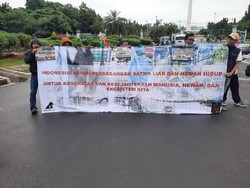 Aktivis Gelar Aksi di Monas Minta Pasar Hewan Ditutup untuk Cegah Corona