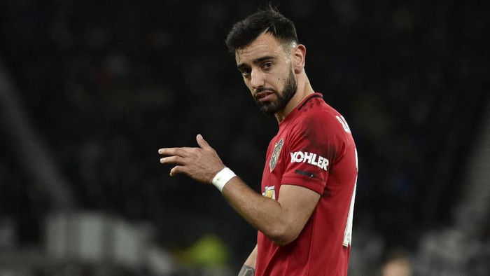Manchester Uniteds Bruno Fernandes reacts during the FA Cup fifth round soccer match between Derby County and Manchester United at Pride Park in Derby, England, Thursday, March 5, 2020. (AP Photo/Rui Vieira)