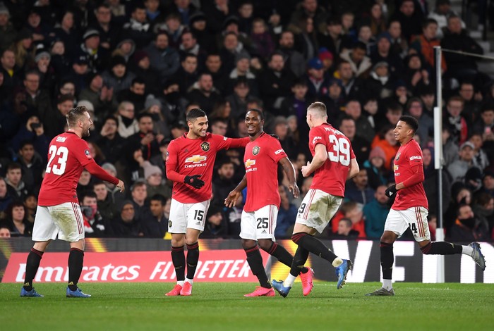 DERBY, ENGLAND - MARCH 05: Odion Ighalo of Manchester United celebrates after scoring his sides third goal with Andreas Pereira during the FA Cup Fifth Round match between Derby County and Manchester United at Pride Park on March 05, 2020 in Derby, England. (Photo by Michael Regan/Getty Images)