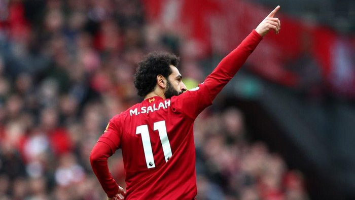 LIVERPOOL, ENGLAND - MARCH 07: Mohamed Salah of Liverpool celebrates after scoring his teams first goal during the Premier League match between Liverpool FC and AFC Bournemouth  at Anfield on March 07, 2020 in Liverpool, United Kingdom. (Photo by Jan Kruger/Getty Images)