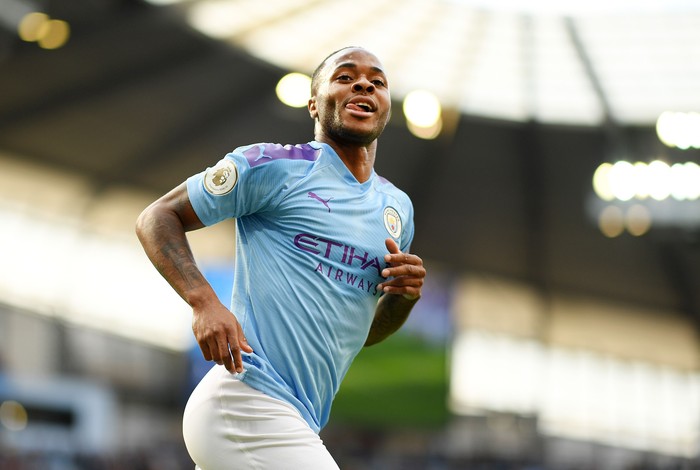 Raheem Sterling MANCHESTER, ENGLAND - AUGUST 17: Raheem Sterling of Manchester City celebrates after scoring his team's first goal during the Premier League match between Manchester City and Tottenham Hotspur at Etihad Stadium on August 17, 2019 in Manchester, United Kingdom. (Photo by Shaun Botterill/Getty Images)