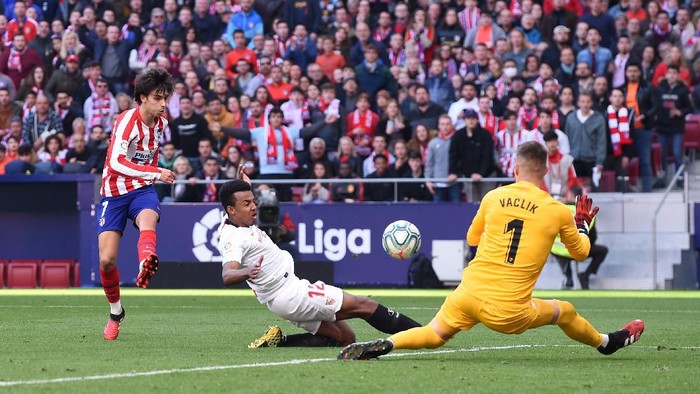 MADRID, SPAIN - MARCH 07: Joao Felix of Atletico Madrid scores his teams second goal  during the Liga match between Club Atletico de Madrid and Sevilla FC at Wanda Metropolitano on March 07, 2020 in Madrid, Spain. (Photo by Denis Doyle/Getty Images)