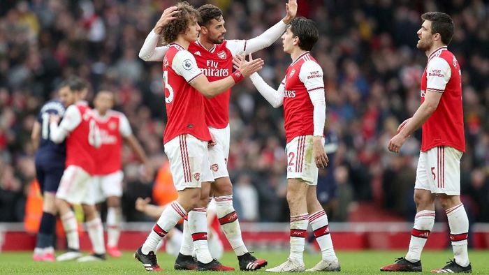 LONDON, ENGLAND - MARCH 07: Players of Arsenal celebrate following the Premier League match between Arsenal FC and West Ham United at Emirates Stadium on March 07, 2020 in London, United Kingdom. (Photo by Alex Morton/Getty Images)