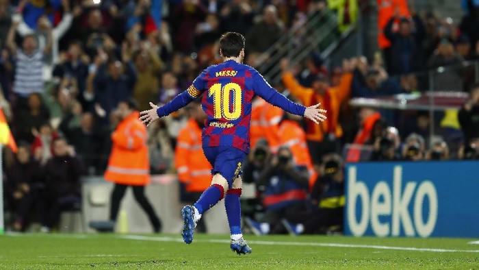 Barcelonas Lionel Messi celebrates after scoring his sides opening goal from the penalty spot during a Spanish La Liga soccer match between Barcelona and Real Sociedad at the Camp Nou stadium in Barcelona, Spain, Saturday, March 7, 2020. (AP Photo/Joan Monfort)