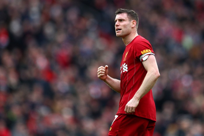 LIVERPOOL, ENGLAND - MARCH 07: James Milner of Liverpool celebrates following his sides victory in the Premier League match between Liverpool FC and AFC Bournemouth  at Anfield on March 07, 2020 in Liverpool, United Kingdom. (Photo by Jan Kruger/Getty Images)