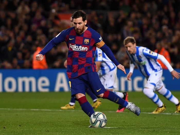 BARCELONA, SPAIN - MARCH 07: Lionel Messi of FC Barcelona scores his teams first goal from the penalty spot during the La Liga match between FC Barcelona and Real Sociedad at Camp Nou on March 07, 2020 in Barcelona, Spain. (Photo by Alex Caparros/Getty Images)