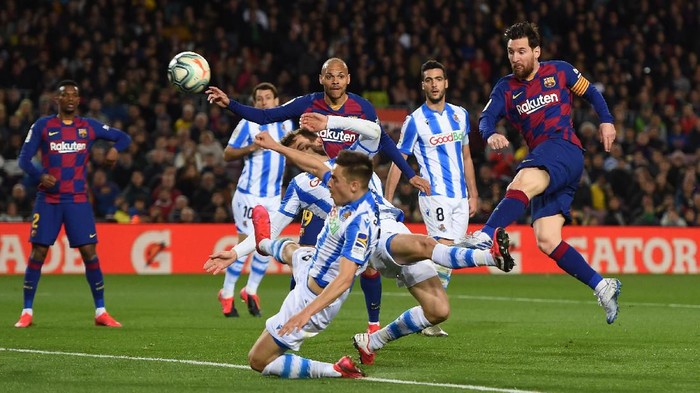 BARCELONA, SPAIN - MARCH 07: Lionel Messi of FC Barcelona shoots during the La Liga match between FC Barcelona and Real Sociedad at Camp Nou on March 07, 2020 in Barcelona, Spain. (Photo by Alex Caparros/Getty Images)
