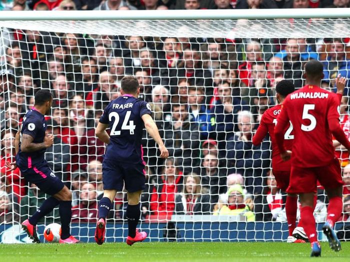 1210952274 LIVERPOOL, ENGLAND - MARCH 07: Callum Wilson of AFC Bournemouth scores his teams first goal during the Premier League match between Liverpool FC and AFC Bournemouth at Anfield on March 07, 2020 in Liverpool, United Kingdom. (Photo by Jan Kruger/Getty Images)