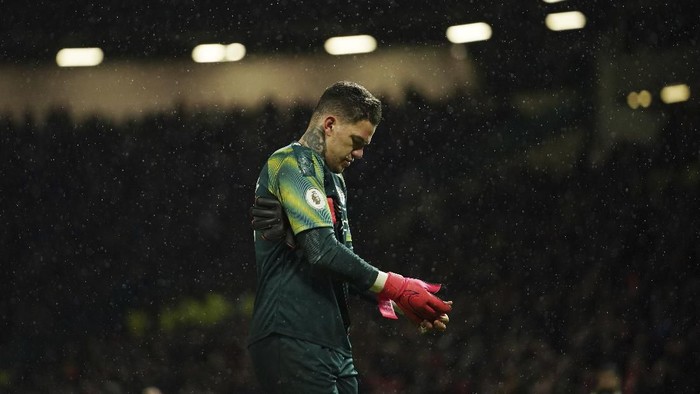 Manchester Citys goalkeeper Ederson leaves a pitch after the English Premier League soccer match between Manchester United and Manchester City at Old Trafford in Manchester, England, Sunday, March 8, 2020. Manchester United won 2-0. (AP Photo/Dave Thompson)