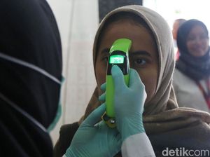 Pemeriksaan Suhu Tubuh di Kemenko PMK