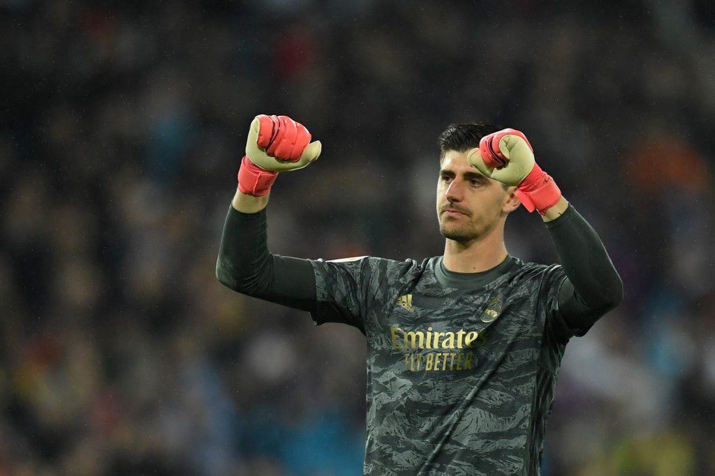 Real Madrid's Belgian goalkeeper Thibaut Courtois celebrates his team's second goal during the Spanish League football match between Real Madrid and Barcelona at the Santiago Bernabeu stadium in Madrid on March 1, 2020. (Photo by OSCAR DEL POZO / AFP)