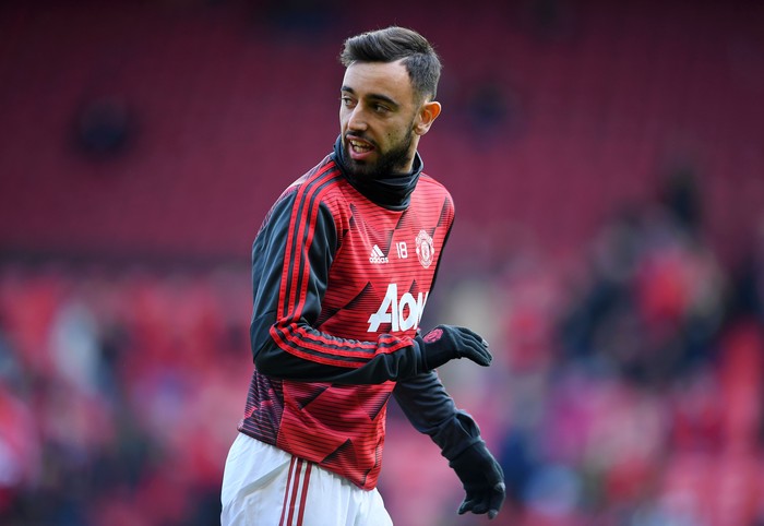 MANCHESTER, ENGLAND - MARCH 08: Bruno Fernandes of Manchester United warms up ahead of the Premier League match between Manchester United and Manchester City at Old Trafford on March 08, 2020 in Manchester, United Kingdom. (Photo by Laurence Griffiths/Getty Images)