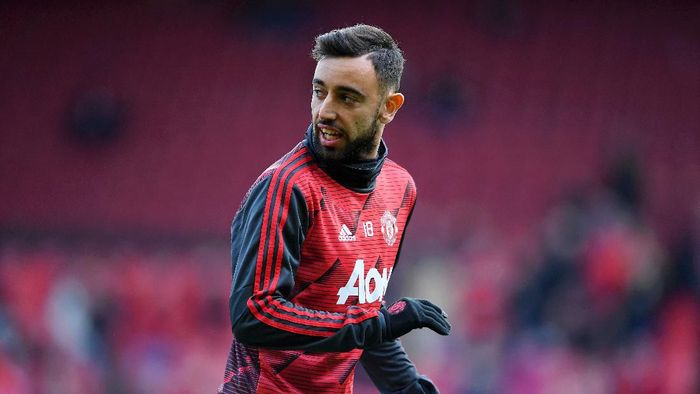 MANCHESTER, ENGLAND - MARCH 08: Bruno Fernandes of Manchester United warms up ahead of the Premier League match between Manchester United and Manchester City at Old Trafford on March 08, 2020 in Manchester, United Kingdom. (Photo by Laurence Griffiths/Getty Images)