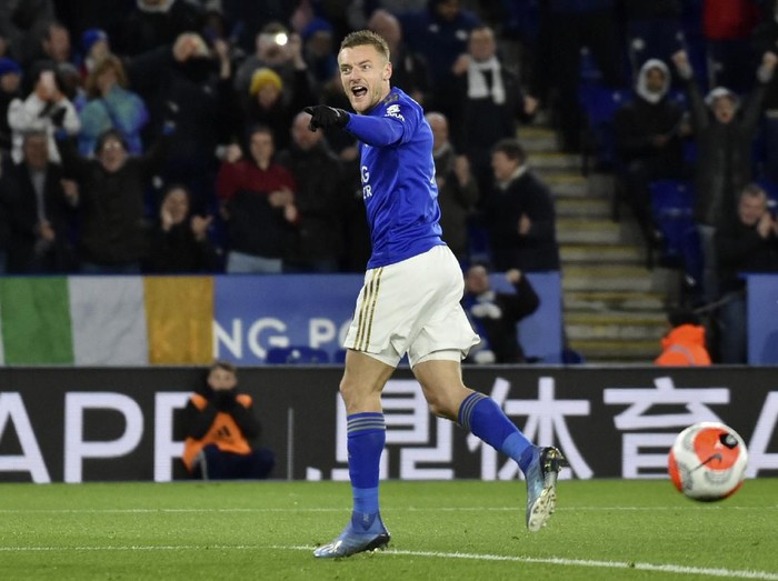 Leicesters Jamie Vardy celebrates after scoring his sides second goal from the penalty spot during the English Premier League soccer match between Leicester City and Aston Villa at the King Power Stadium, in Leicester, England, Monday, March 9, 2020. (AP Photo/Rui Vieira)