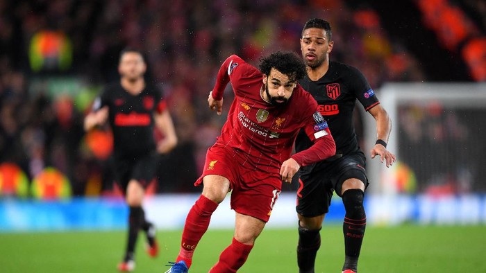 LIVERPOOL, ENGLAND - MARCH 11: Mohamed Salah of Liverpool reacts to defeat after the UEFA Champions League round of 16 second leg match between Liverpool FC and Atletico Madrid at Anfield on March 11, 2020 in Liverpool, United Kingdom.  (Photo by Laurence Griffiths/Getty Images)
