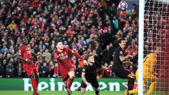 LIVERPOOL, ENGLAND - MARCH 11: Andy Robertson of Liverpool hits the bar with a header during the UEFA Champions League round of 16 second leg match between Liverpool FC and Atletico Madrid at Anfield on March 11, 2020 in Liverpool, United Kingdom.  (Photo by Laurence Griffiths/Getty Images)