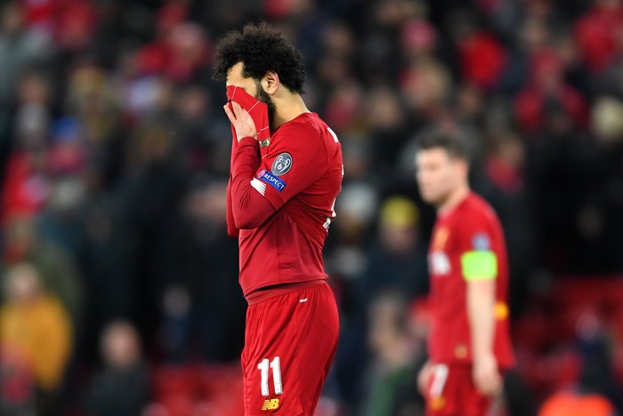 LIVERPOOL, ENGLAND - MARCH 11: Mohamed Salah of Liverpool reacts to defeat after the UEFA Champions League round of 16 second leg match between Liverpool FC and Atletico Madrid at Anfield on March 11, 2020 in Liverpool, United Kingdom.  (Photo by Laurence Griffiths/Getty Images)