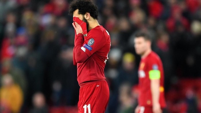 LIVERPOOL, ENGLAND - MARCH 11: Mohamed Salah of Liverpool reacts to defeat after the UEFA Champions League round of 16 second leg match between Liverpool FC and Atletico Madrid at Anfield on March 11, 2020 in Liverpool, United Kingdom.  (Photo by Laurence Griffiths/Getty Images)