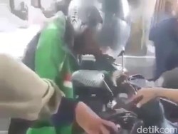 Gojek Pastikan Driver Duduk Membeku di Atas Motor Tak Terkait Corona