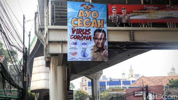 Spanduk Cegah Corona Bergambar Anies Mejeng di Tendean