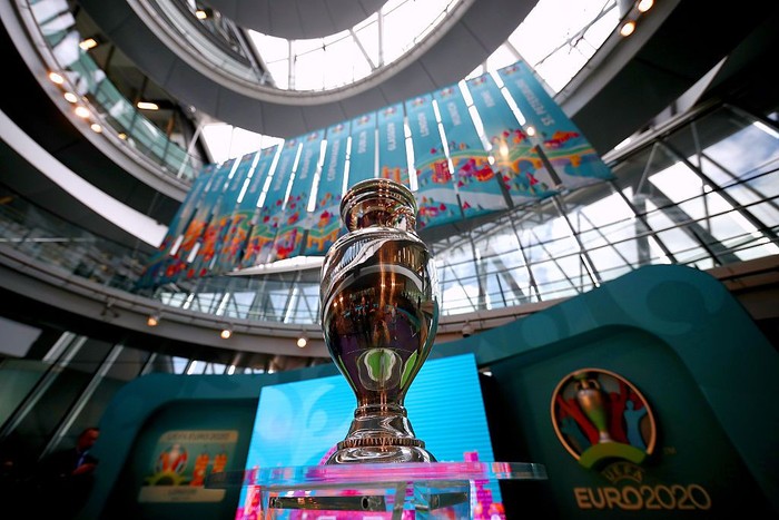 LONDON, ENGLAND - SEPTEMBER 21:  The UEFA European Championship trophy is displayed next to the logo for the UEFA EURO 2020 tournament and the individual city logos during the UEFA EURO 2020 launch event for London at City Hall on September 21, 2016 in London, England.  (Photo by Dan Istitene/Getty Images)
