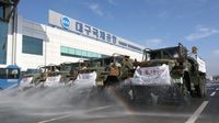 Lawan Corona: Truk, Robot, dan Drone Turun ke Jalan Semprot Disinfektan
