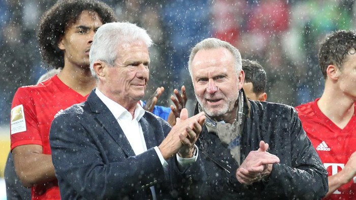 Co-founder of German software company SAP and chief financial backer of German first division Bundesliga football club TSG Hoffenheim Dietmar Hopp (2ndL) and Bayern Munichs CEO Karl-Heinz Rummenigge applaud  on the pitch after the suspension of the German first division Bundesliga football match Hoffenheim v Bayern Munich on February 29, 2020 in Sinsheim. (Photo by Daniel ROLAND / AFP) / DFL REGULATIONS PROHIBIT ANY USE OF PHOTOGRAPHS AS IMAGE SEQUENCES AND/OR QUASI-VIDEO
