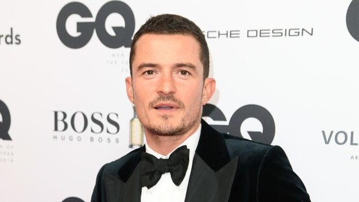 Model Miranda Kerr and actor Orlando Bloom attend the 