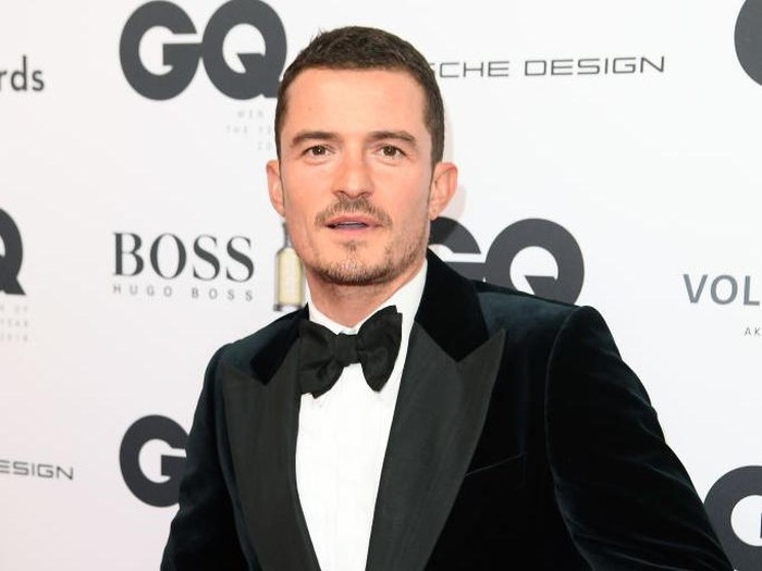 Model Miranda Kerr and actor Orlando Bloom attend the 