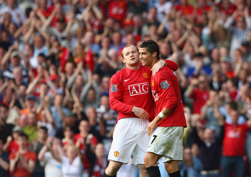 MANCHESTER, UNITED KINGDOM - SEPTEMBER 27:  Wayne Rooney of Manchester United celebrates scoring his team's second goal with team mate Cristiano Ronaldo (R) during the Barclays Premier League match between Manchester United and Bolton Wanderers at Old Trafford on September 27, 2008 in Manchester, England.  (Photo by Clive Brunskill/Getty Images)