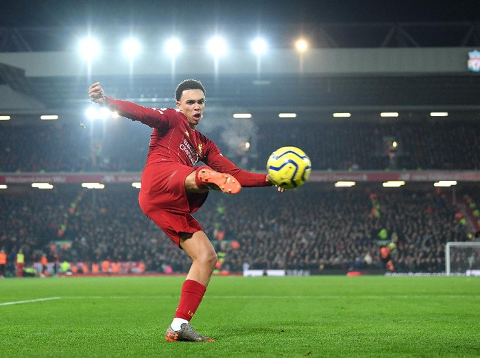 LIVERPOOL, ENGLAND - JANUARY 19: Trent Alexander-Arnold of Liverpool crosses the ball during the Premier League match between Liverpool FC and Manchester United at Anfield on January 19, 2020 in Liverpool, United Kingdom. (Photo by Michael Regan/Getty Images)