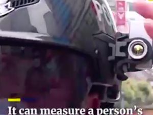 Helm Anti Corona Polisi China