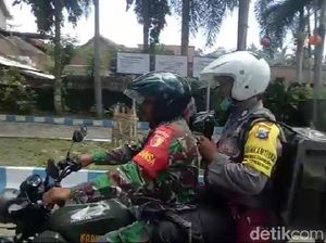 Sosialisasi Pencegahan Covid-19, Babinsa dan Bhabinkamtibmas Keliling Kampung