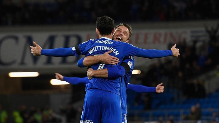 CARDIFF, WALES - OCTOBER 19:  Cardiff player Peter Whittingham (l) is congratulated by Rickie Lambert (r) after scoring the opening goal from a free kick  during the Sky Bet Championship match between Cardiff City and Sheffield Wednesday at Cardiff City Stadium on October 19, 2016 in Cardiff, Wales.  (Photo by Stu Forster/Getty Images)