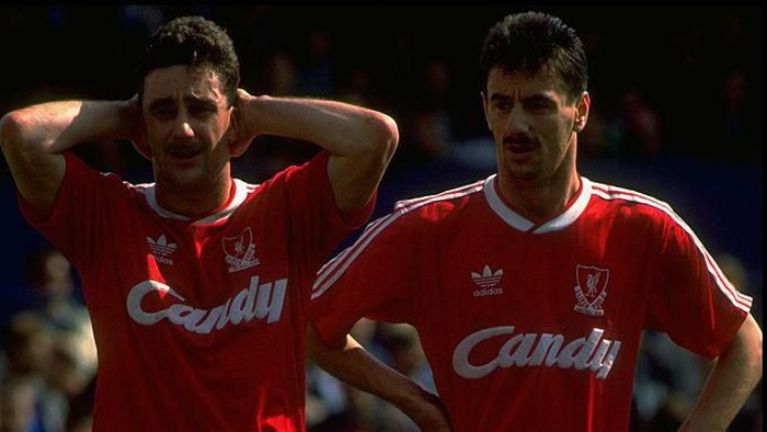 1988:  John Aldridge and Ian Rush of Liverpool take a rest during a Barclays League Division One match against Wimbledon at Plough Lane in London. Liverpool won the match 2-1.  Mandatory Credit: Simon  Bruty/Allsport