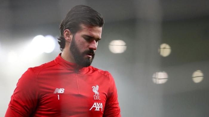 WOLVERHAMPTON, ENGLAND - JANUARY 23:  Alisson Becker of Liverpool looks on during the warm-up before Premier League match between Wolverhampton Wanderers and Liverpool FC at Molineux on January 23, 2020 in Wolverhampton, United Kingdom. (Photo by Catherine Ivill/Getty Images)