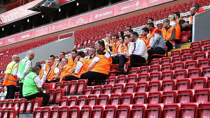 Stewards during the Barclays Premier League match between Liverpool and Watford at Anfield on May 08, 2016 in Liverpool, England.