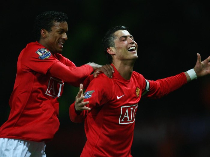 MANCHESTER, UNITED KINGDOM - MARCH 19:  Cristiano Ronaldo of Manchester United  celebrates with Luis Nani (L) as he scores their second goal during the Barclays Premier League match between Manchester United and Bolton Wanderers at Old Trafford on March 19, 2008 in Manchester, England.  (Photo by Alex Livesey/Getty Images)
