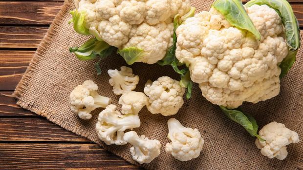 Fresh cauliflower on wooden table